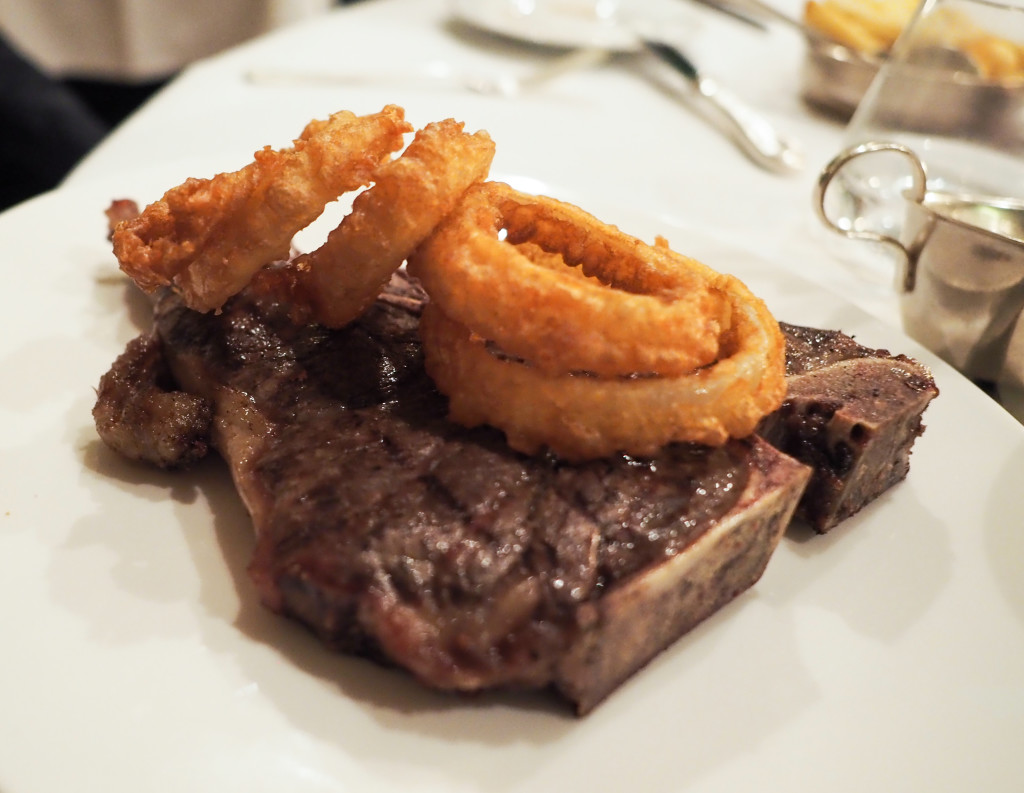 T-BONE STEAK WITH ONION RINGS